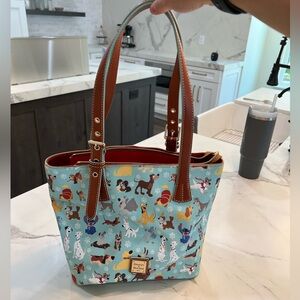Dooney & Bourke Disney dogs purse never used but tags taken off